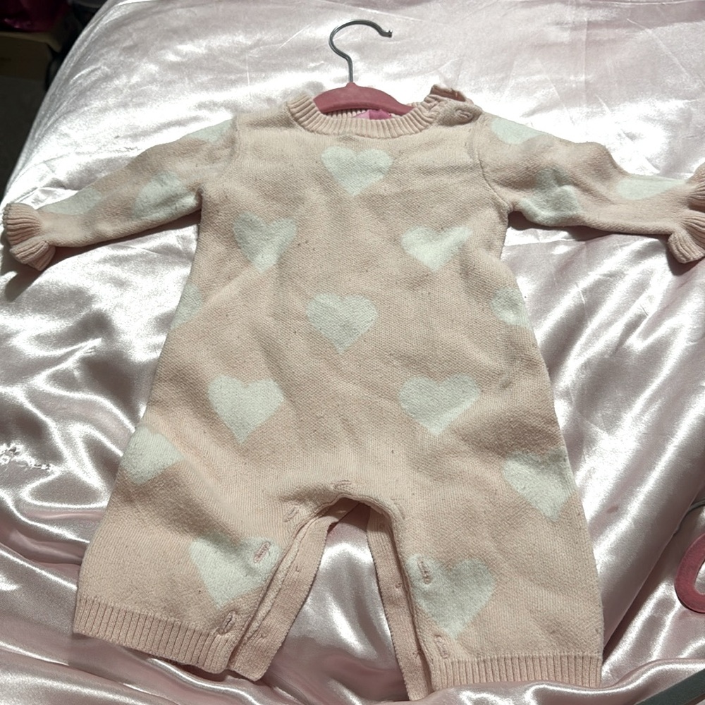 Pink and white baby one piece jumpsuit long sleeve with ruffles on the wrist